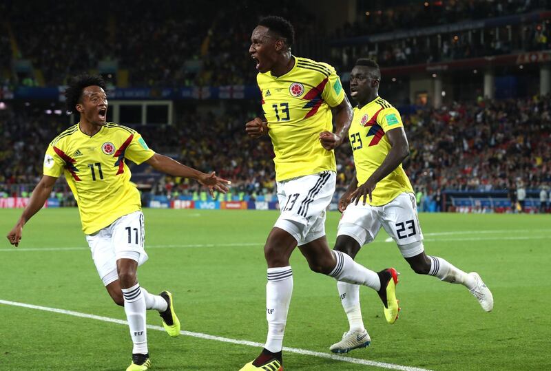 Colombia's Yerry Mina celebrates his last gasp equaliser. Clive Rose / Getty Images