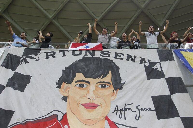 Corinthians football club fans display a tribute banner to Ayrton Senna before the team's match against Nacional on Wednesday. Bruno Kelly / Reuters / April 30, 2014