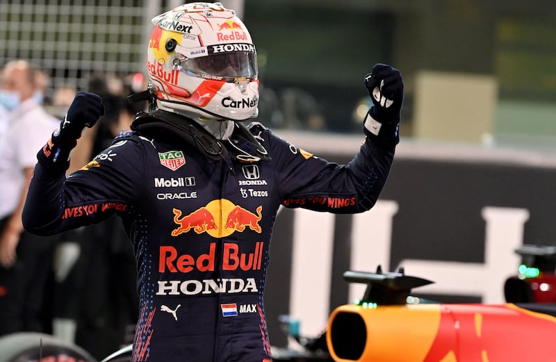 Red Bull's Max Verstappen celebrates at the Yas Marina Circuit after claiming pole position at the Abu Dhabi Grand Prix on Saturday, December 11. AFP