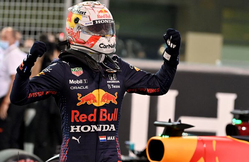 Red Bull's Max Verstappen celebrates at the Yas Marina Circuit after claiming pole position at the Abu Dhabi Grand Prix on Saturday, December 11. AFP