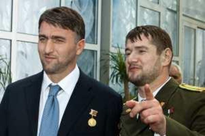  183: GROZNY, RUSSIA. MARCH 30, 2009. Pictured in this undated file image is the former commander of Vostok battalion, Lieutenant-Colonel Sulim Yamadayev (Yamadaev), right, and State Duma member, Adam Delimkhanov. Yamadayev died of gunshot wounds after coming under fire outside his home in Dubai, United Arab Emirates, Sunday, 29 March, 2009.  *** Local Caption ***  na07 ap murder 3.jpg