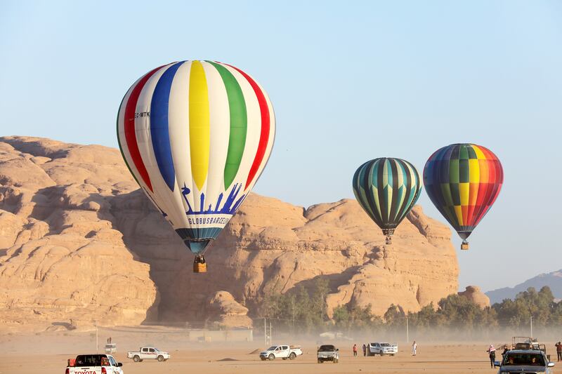 Hot-air balloons rise from Wadi Rum. Reuters