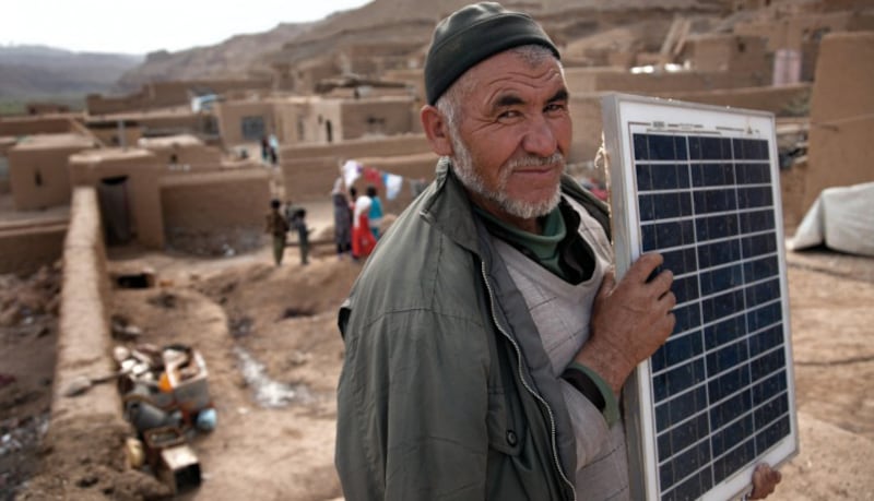 Masdar helped thousands of people in Afghanistan to access power though solar rooftop panels. Photo: Masdar