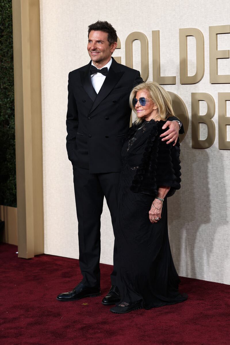 Bradley Cooper, in custom Louis Vuitton, with his mother Gloria Campano. Reuters 