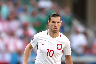 Poland's preparations for their World Cup qualifier against England suffered a further blow after they reported two positive cases of coronavirus - Grzegorz Krychowiak, above, and Kamil Piatkowski. PA