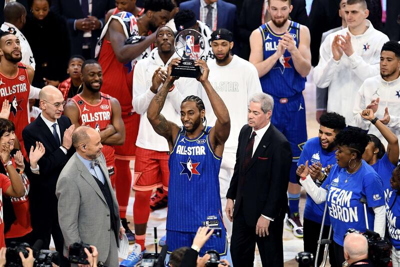 Kawhi Leonard of Team LeBron celebrates with the trophy after being named the Kobe Bryant MVP. AFP
