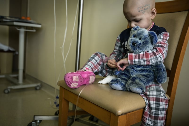 Three-year-old Quin with Blu-Blu the bear, on the pediatric oncology ward at St Georges Hospital in Beirut.  All photos: Elizabeth Fitt / The National