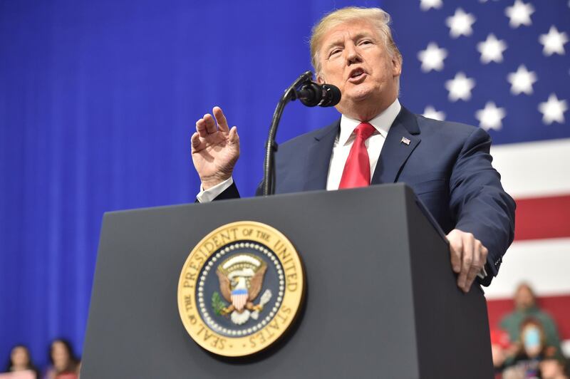 US President Donald Trump delivers remarks at the Make America Great Again Rally on March 10, 2018 in Moon Township, Pennsylvania. / AFP PHOTO / Nicholas Kamm