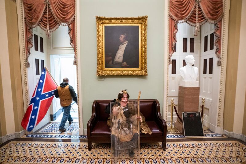 epa08923404 Supporters of US President Donald J. Trump outside the senate chambers after breaching Capitol security in Washington, DC, USA, 06 January 2021. Protesters entered the US Capitol where the  Electoral College vote certification for President-elect Joe Biden took place.  EPA/JIM LO SCALZO