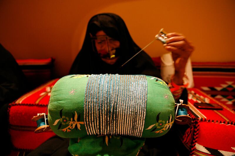 Abu Dhabi, United Arab Emirates, 30 June,2013:
Umm Abdullah showing off her Talli talent, which is a traditional Emirati embroidery to adorn collars and cuffs at the Abu Dhabi National Exhibition Center on Summer Festival.
Asmaa Al Hameli / The National