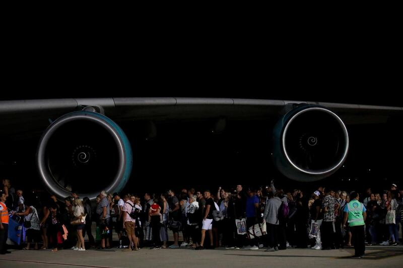 British passengers board an Airbus A380 airliner that is being used for transporting Thomas Cook customers at Dalaman Airport in Turkey. Reuters