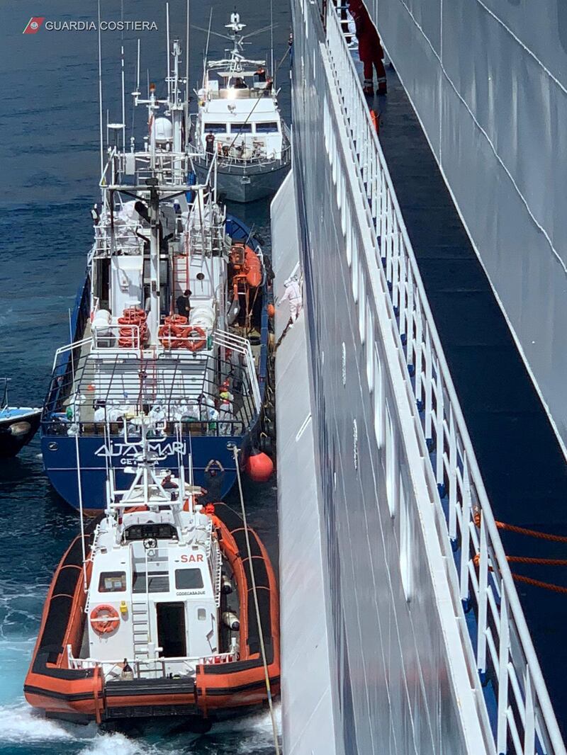 ITALY: Migrants are being transferred form the NGO boat Aita Mari to the Italian ship Rubattino, to be quarantined because of the coronavirus outbreak, off the coast of Palermo, on April 19, 2020. Reuters
