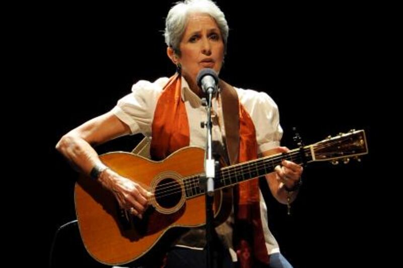 US singer Joan Baez performs during a concert, on April 06, 2011 in Marseille, southeastern France. AFP PHOTO / ANNE-CHRISTINE POUJOULAT