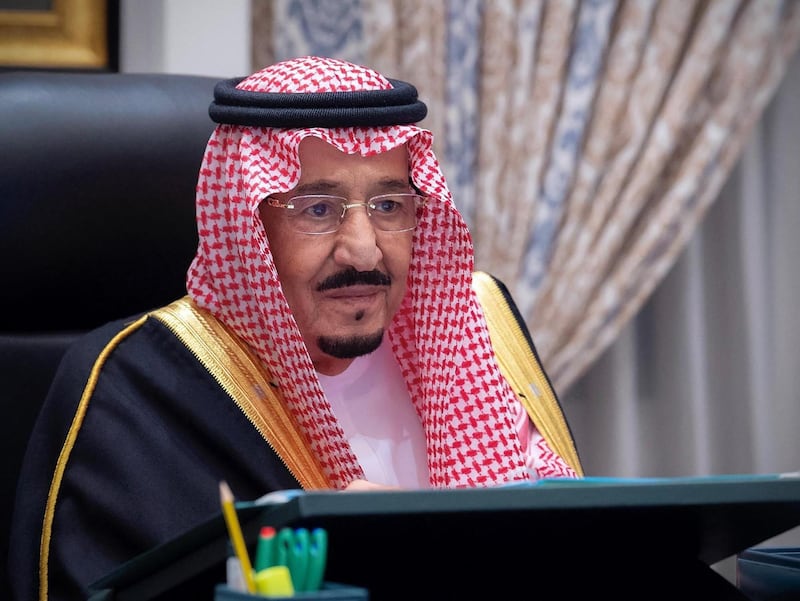 A handout picture provided by the Saudi Press Agency (SPA) on December 15, 2020 shows Saudi Arabia's King Salman bin Abdulaziz attending a virtual cabinet meeting in the capital Riyadh discussing the 2021 state budget. - Saudi Arabia projected its 2020 budget deficit will soar to around $79 billion, the finance ministry said Tuesday, as the world's top crude exporter reels from a coronavirus-led economic downturn. Late last year, the kingdom projected a budget deficit of $50 billion for 2020, up $15 billion on 2019. (Photo by - / SPA / AFP) / === RESTRICTED TO EDITORIAL USE - MANDATORY CREDIT "AFP PHOTO / HO / SPA" - NO MARKETING NO ADVERTISING CAMPAIGNS - DISTRIBUTED AS A SERVICE TO CLIENTS ===