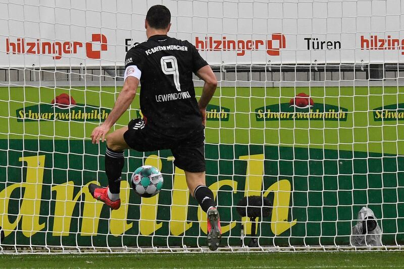 Robert Lewandowski misses a glorious chance for Bayern. AFP
