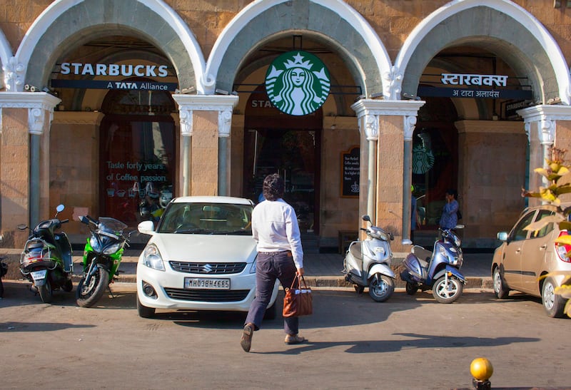 18 April 2016 - Mumbai - INDIA.
A customer walks into Starbucks at Mumbai.

(Subhash Sharma for The National) *** Local Caption ***  food (24).jpg