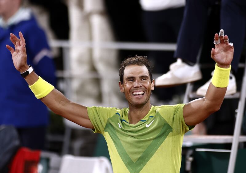 Rafael Nadal of Spain celebrates winning against Novak Djokovic of Serbia in their men's French Open quarter-final match at Roland Garros in Paris on Wednesday.  EPA