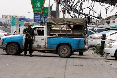 A Houthi fighter stands guard at a square as the country's intensified fighting continues, in Sana'a, Yemen. EPA