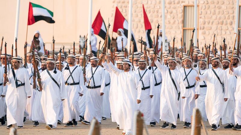 AL WATHBA, ABU DHABI, UNITED ARAB EMIRATES - December 03, 2017: Hamad Al Ameri (C), sings during the Union March, during the Sheikh Zayed Heritage Festival. 
( Rashed Al Mansoori / Crown Prince Court - Abu Dhabi )
---
