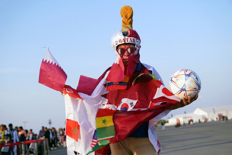 One fan's journey around the world in flag form. AFP