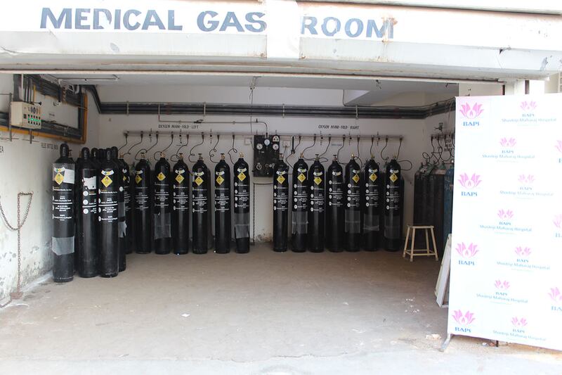 Oxygen cylinders reach hospitals in western India overwhelmed by a rapid rise in Covid-19 cases.