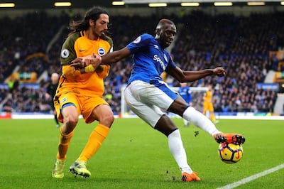 LIVERPOOL, ENGLAND - MARCH 10: Yannick Bolasie of Everton in action with Ezequiel Schelotto of Brighton and Hove Albion during the Premier League match between Everton and Brighton and Hove Albion at Goodison Park on March 10, 2018 in Liverpool, England. (Photo by Chris Brunskill Ltd/Getty Images)