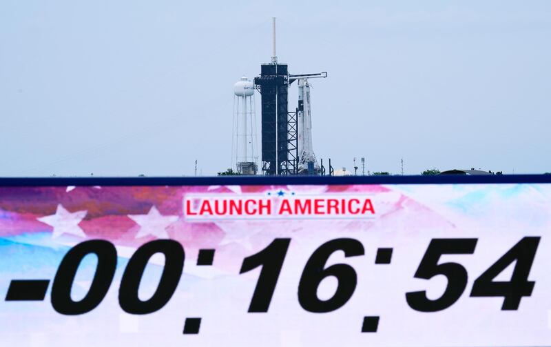 Nasa's first manned mission since the end of the Space Shuttle programme in 2011 was called off 17 minutes before launch because of bad weather and rescheduled for May 30, 2020. AP Photo