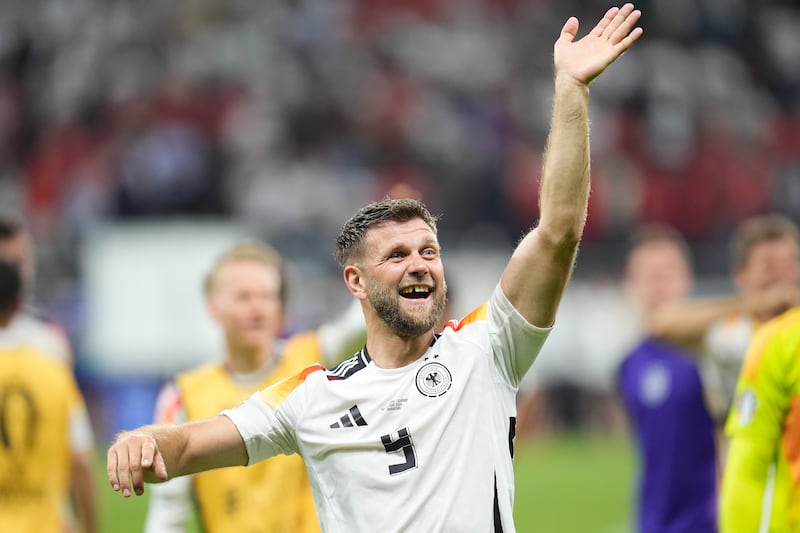 Germany's Niclas Fullkrug celebrates after the game. PA 