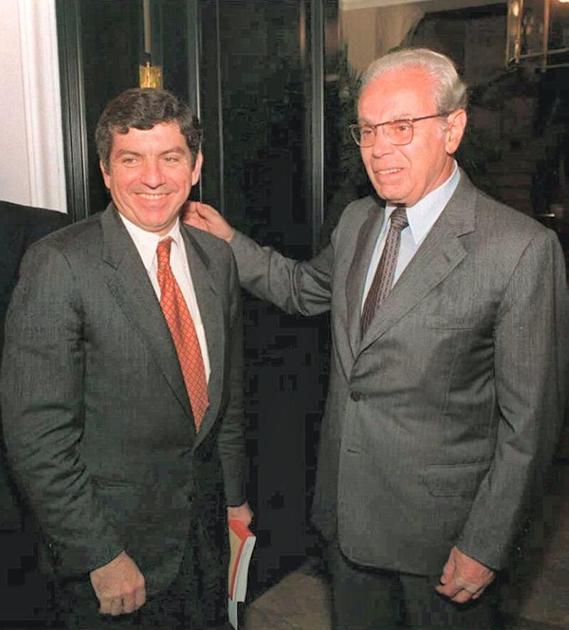 Former UN Secretary General and Peruvian presidential candidate Javier Perez de Cuellar (R) poses with Cesar Gaviria, former Colombian President and current secretary General of the Organization of American States (OAS) 07 April 1995 shortly after their private meeting at De Cuellar's residence. Gaviria is heading an OAS delegation of 70 observers for the country's 09 April general elections. (Photo by PEDRO UGARTE / AFP)