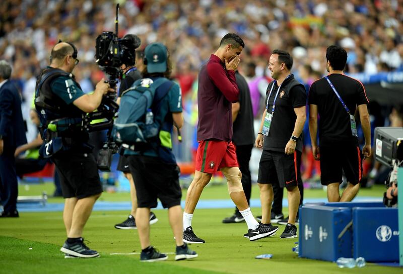 PARIS, FRANCE - JULY 10:  Cristiano Ronaldo of Portugal celebrates winning at the final whistle during the UEFA EURO 2016 Final match between Portugal and France at Stade de France on July 10, 2016 in Paris, France.  (Photo by Matthias Hangst/Getty Images)