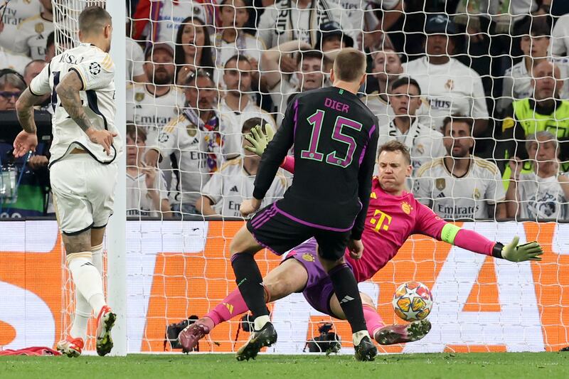 Joselu scores his Real Madrid's first goal past Bayern goalkeeper Manuel Neuer. Getty Images