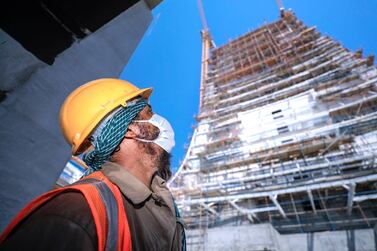 Abu Dhabi, United Arab Emirates, September 27, 2020. Abu Dhabi City Municipality inspectors check safety standards of a construction site at the Al Raha Gardens, Abu Dhabi. Victor Besa/The National Section: NA Reporter: Haneen Dajani