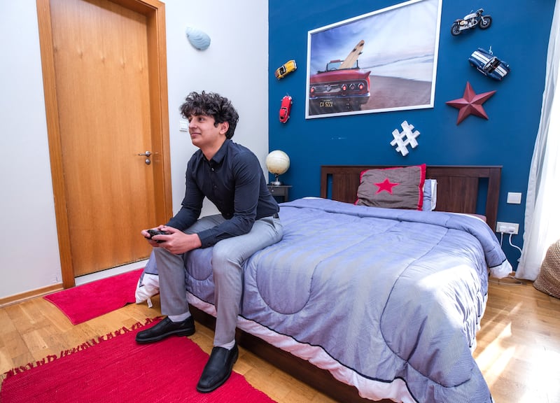 Zaid Yacoub gaming in his bedroom. Victor Besa / The National