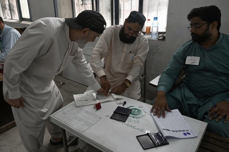 A man casts his vote during provincial assembly by-elections in Pakistan's Punjab province on Sunday. EPA