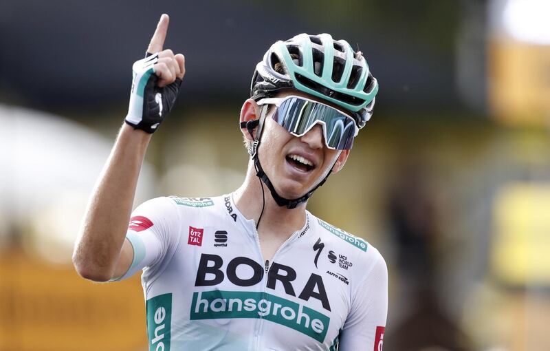 German rider Lennard Kamna celebrates winning Stage 16 of the Tour de France on Tuesday, September 15. EPA