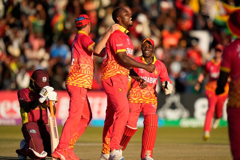 Zimbabwe players celebrate their win over West Indies in their Cricket World Cup Qualifier in Harare on Saturday, June, 24, 2023. AP
