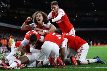 Arsenal celebrate in their comprehensive victory over Newcastle. Getty