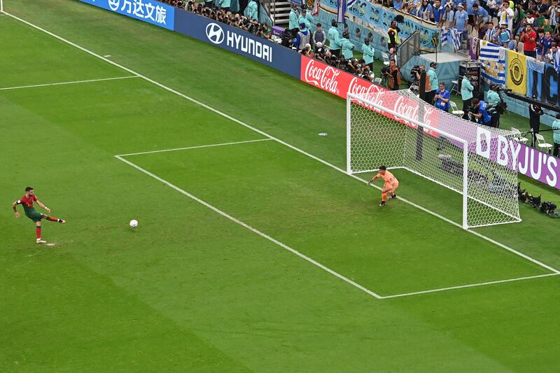 Portugal's Bruno Fernandes scores the second from the penalty spot. AFP