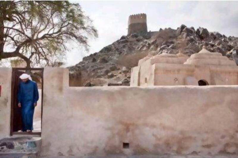 A worshipper at the 300-year-old Al Bidiya mosque in Fujairah.