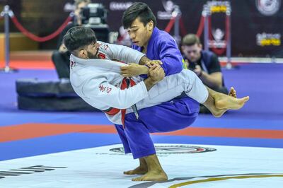 Gabriel de Sousa, in blue, is ranked No 1 but has three rivals breathing down his neck for the world title. Courtesy UAEJJF