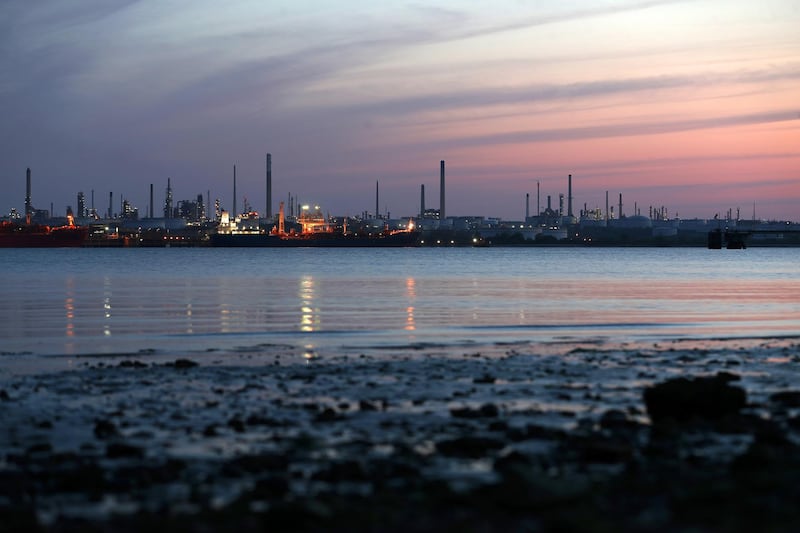 SOUTHAMPTON - APRIL 21: General views as the sun sets behind Fawley Oil Refinery on April 21, 2020 in Southampton, United Kingdom. The slump in demand for oil due to the ongoing COVID-19 coronavirus pandemic, combined with the failure of oil-producing countries to slow production has resulted in the price of crude oil crashing, with US oil trading briefly at minus $37 a barrel yesterday. (Photo by Naomi Baker/Getty Images)
