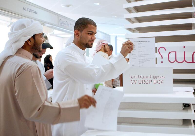 Emirati students during a jobs fair in Dubai. Less than 2 per cent of the country’s 2.2 million private sector jobs are occupied by Emiratis, according to TCO Management Consulting research. Paulo Vecina / The National