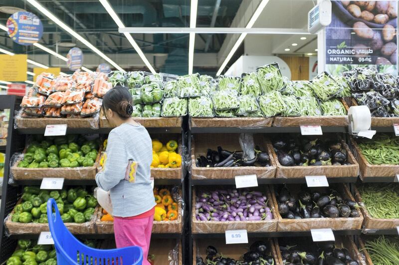 DUBAI, UNITED ARAB EMIRATES - DECEMBER 30, 2018. 

A woman at the vegetable section in Union Coop in Umm Suqeim 2.

(Photo by Reem Mohammed/The National)

Reporter: 
Section:  NA STANDALONE