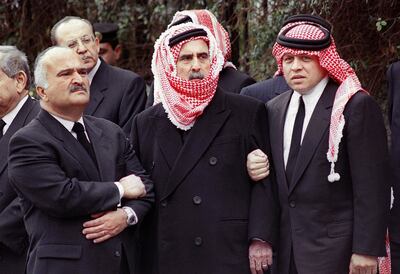 Jordanian King Abdallah (R) stands with his uncles Prince Mohammad (C) and Prince Hassan during the funeral procession of his father, King Hussien, who was buried 08 February in Amman. King Hussein died 07 February at the age of 63 after losing his seven-month-long battle against cancer. (Photo by KHALIL MAZRAAWI / AFP)