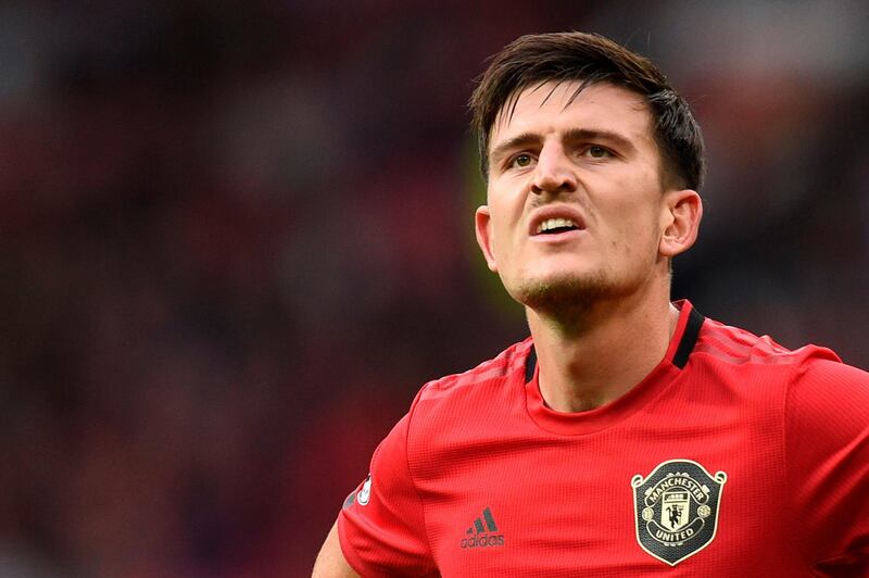 Manchester United's English defender Harry Maguire reacts to their win at the final whistle in the English Premier League football match between Manchester United and Chelsea at Old Trafford in Manchester, north west England, on August 11, 2019. Manchester United won the game 4-0. - RESTRICTED TO EDITORIAL USE. No use with unauthorized audio, video, data, fixture lists, club/league logos or 'live' services. Online in-match use limited to 120 images. An additional 40 images may be used in extra time. No video emulation. Social media in-match use limited to 120 images. An additional 40 images may be used in extra time. No use in betting publications, games or single club/league/player publications.
 / AFP / Oli SCARFF                           / RESTRICTED TO EDITORIAL USE. No use with unauthorized audio, video, data, fixture lists, club/league logos or 'live' services. Online in-match use limited to 120 images. An additional 40 images may be used in extra time. No video emulation. Social media in-match use limited to 120 images. An additional 40 images may be used in extra time. No use in betting publications, games or single club/league/player publications.
