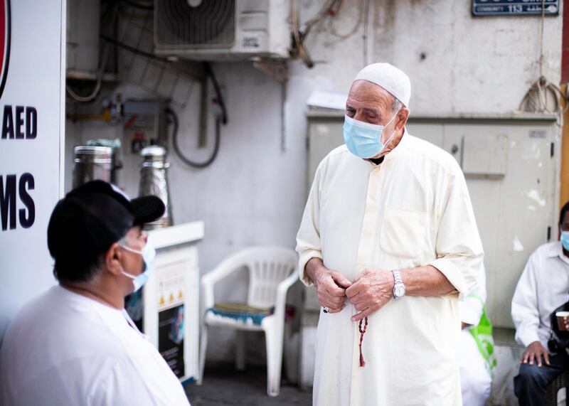 DUBAI, UNITED ARAB EMIRATES.  7 FEBRUARY 2021. 
Hussain Al Khawali runs his coffee stall in Al Sabkha. 
He's been in the same neighborhood, serving coffee to the community, for 40 years. 
Photo: Reem Mohammed / The National
Reporter: