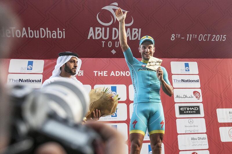 Andrea Guardini of Astana Pro Team celebrates on the podium on Thursday after winning Stage 1 of the Abu Dhabi Tour. Mona Al Marzooqi / The National