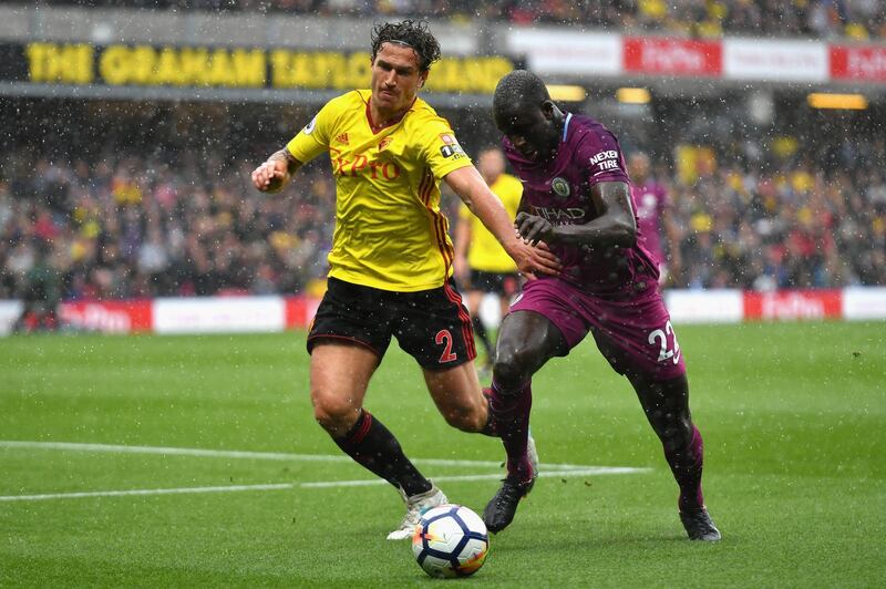 WATFORD, ENGLAND - SEPTEMBER 16:  Benjamin Mendy of Manchester City attempts to get past Daryl Janmaat of Watford during the Premier League match between Watford and Manchester City at Vicarage Road on September 16, 2017 in Watford, England.  (Photo by Dan Mullan/Getty Images)