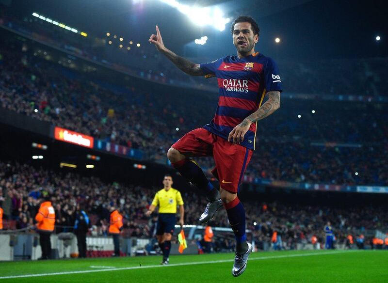 Barcelona’s Dani Alves celerbates his goal on Wednesday night in a Copa del Rey victory at the Camp Nou. David Ramos / Getty Images