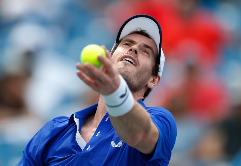 Andy Murray, of Britain, serves against Richard Gasquet, of France, during first-round play at the Western & Southern Open tennis tournament Monday, Aug. 12, 2019, in Mason, Ohio. (AP Photo/Gary Landers)
